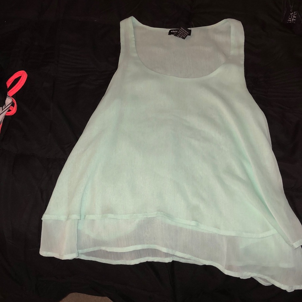 Light green tank top.